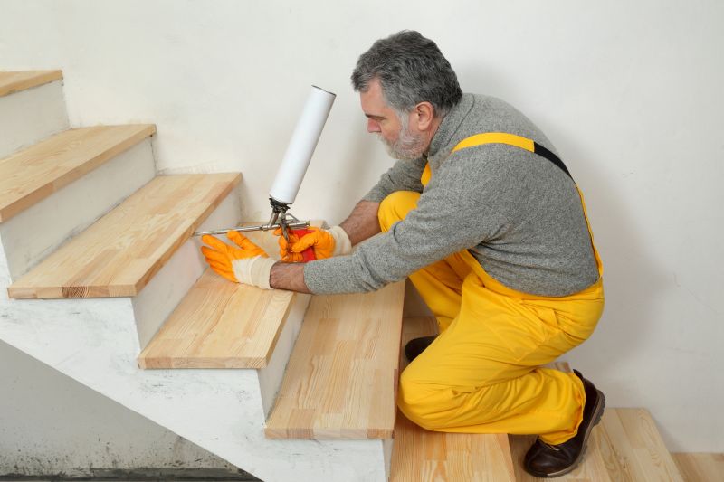 Carpenters Installing Wood Stairs